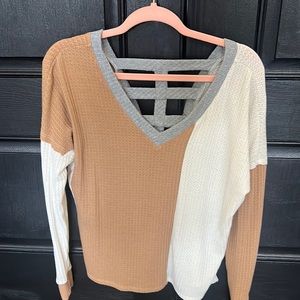 buckle, multi colored sweater